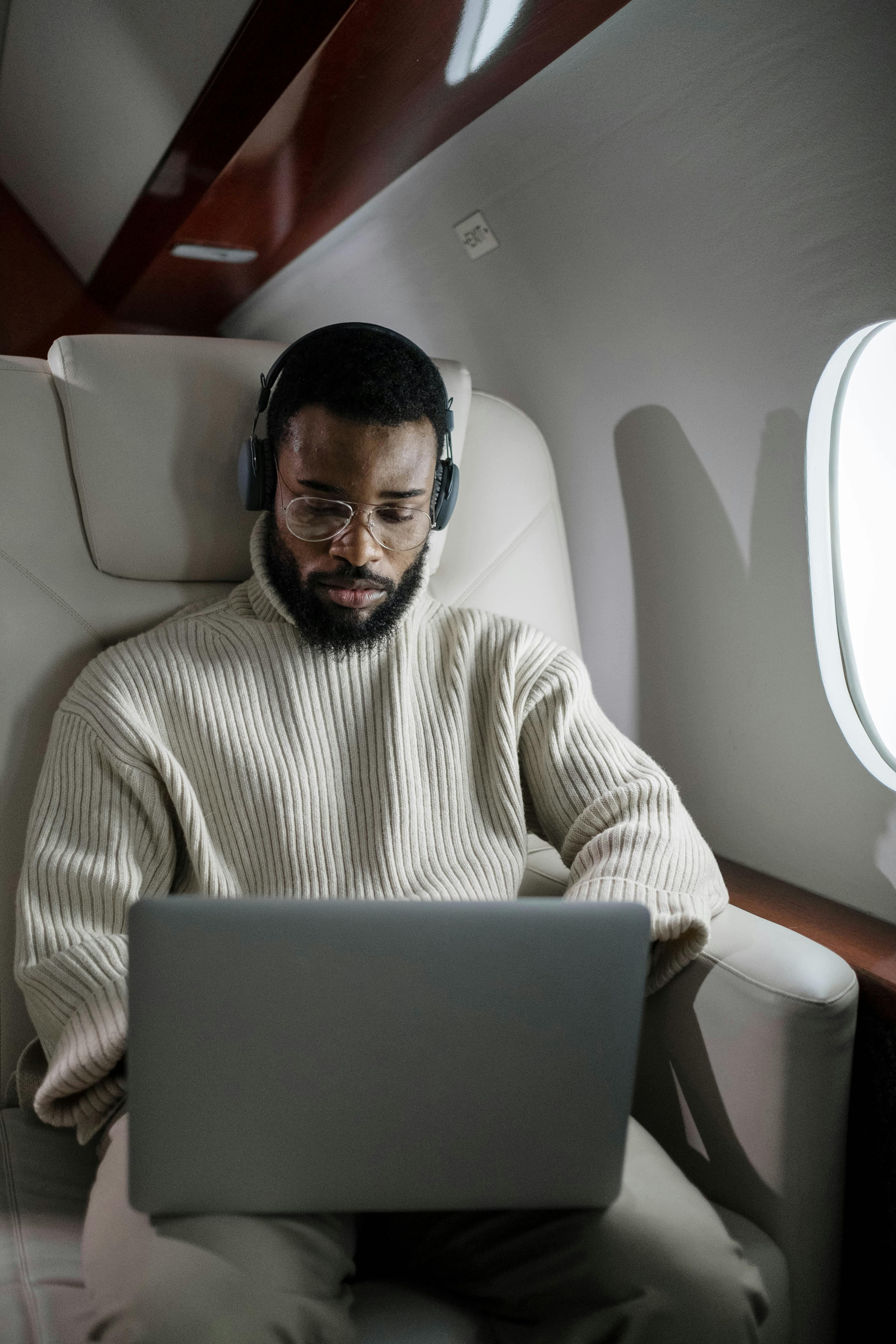 A client at work in a private jet cabin.
